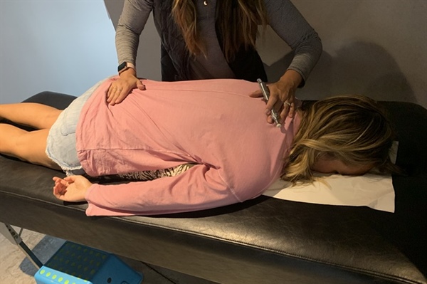 3 Causes of Mid-Back Pain & Care Options at Restore Chiropractic